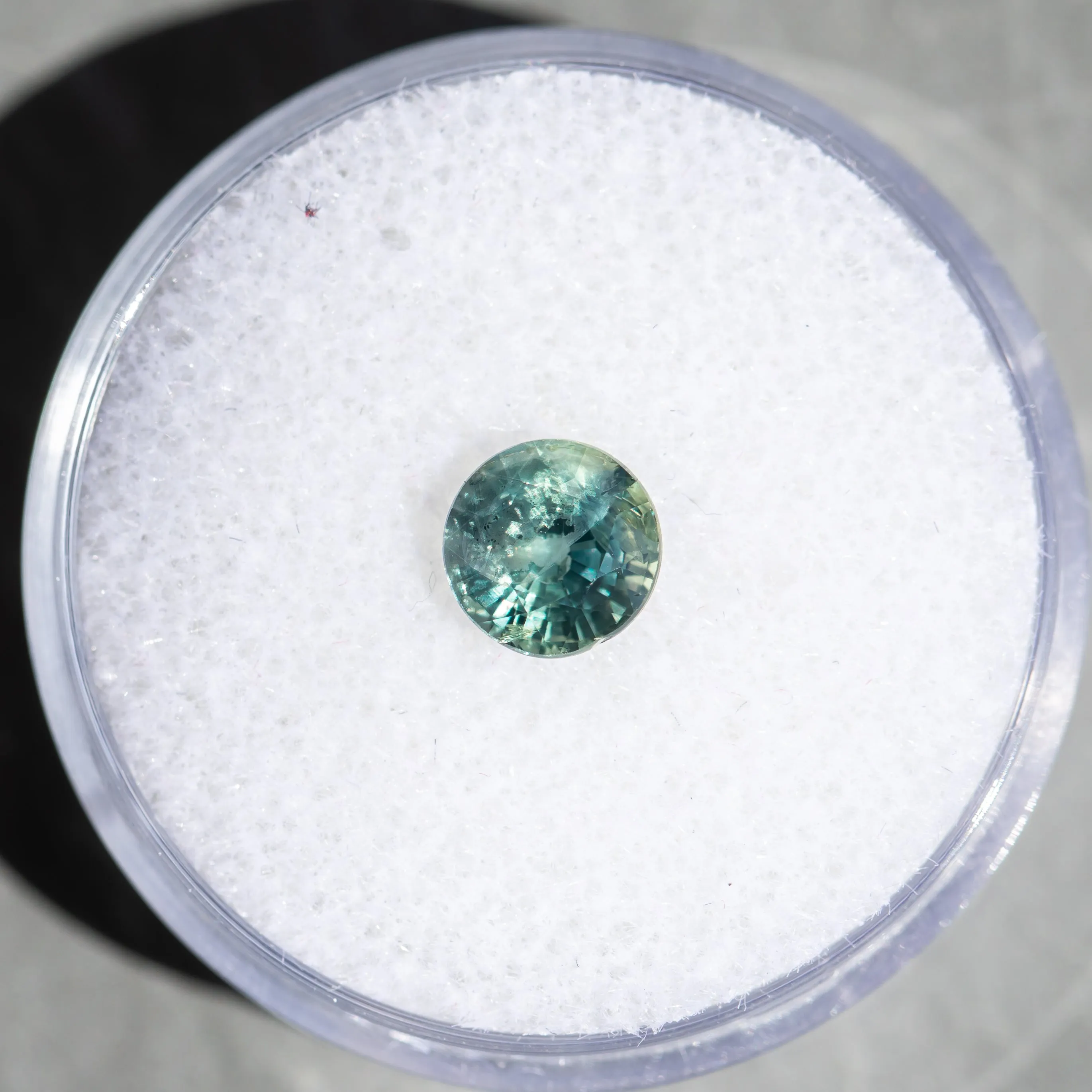 1.27CT ROUND MADAGASCAR SAPPHIRE, COLOR SHIFTING TEAL TO GREY, 6.07X4.20X3.42MM