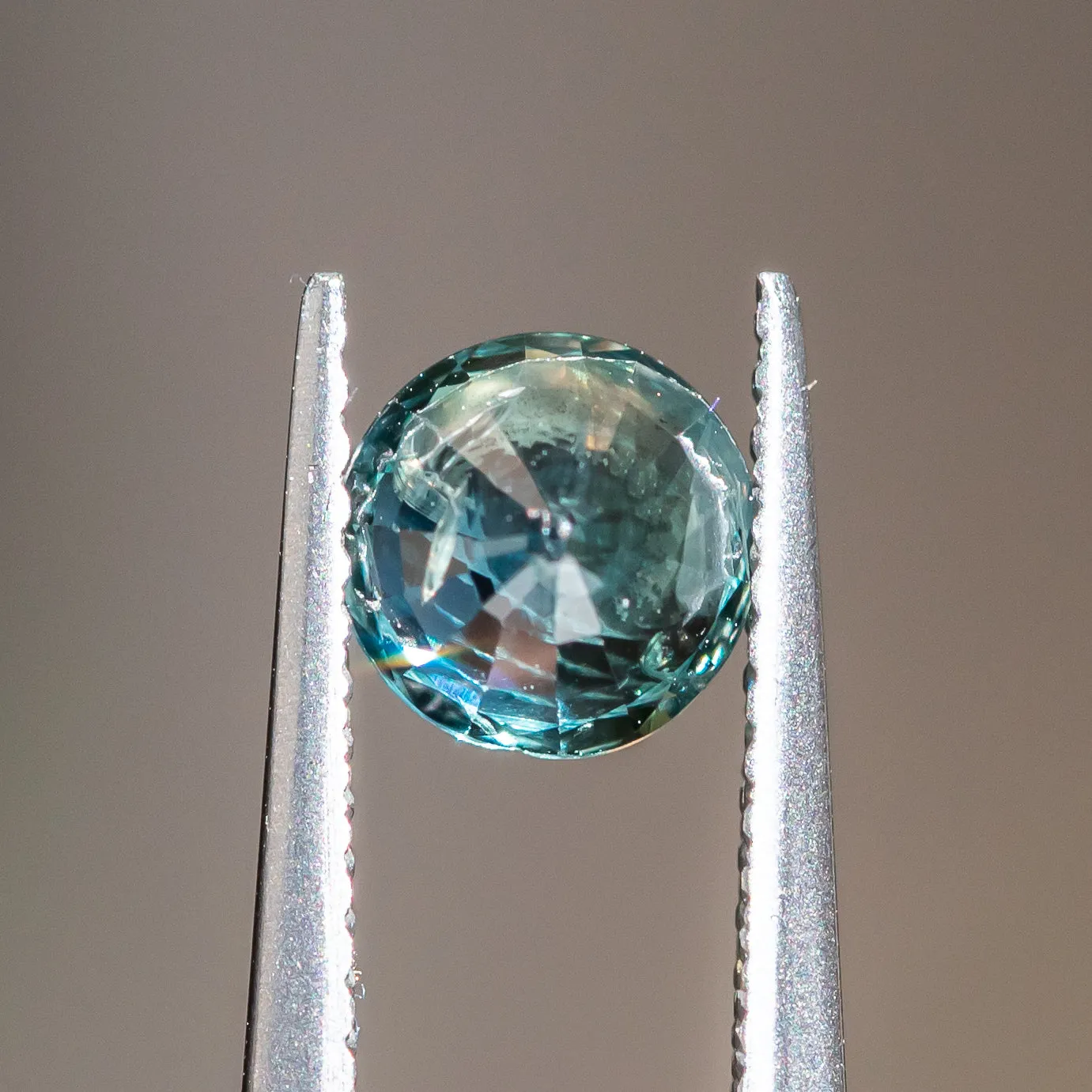 1.27CT ROUND MADAGASCAR SAPPHIRE, COLOR SHIFTING TEAL TO GREY, 6.07X4.20X3.42MM