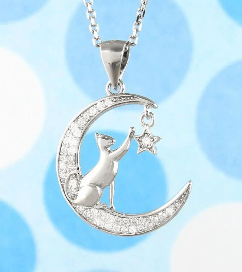 Cat Reaching for a Star on a Crescent Moon Pendant